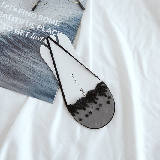 Schwarze Spitzensocken mit hohem Absatz