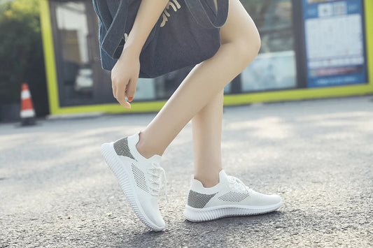 Baskets de sport blanches en maille respirante pour femmes