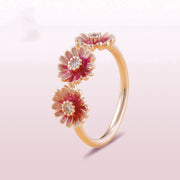 Three pink daisy rings