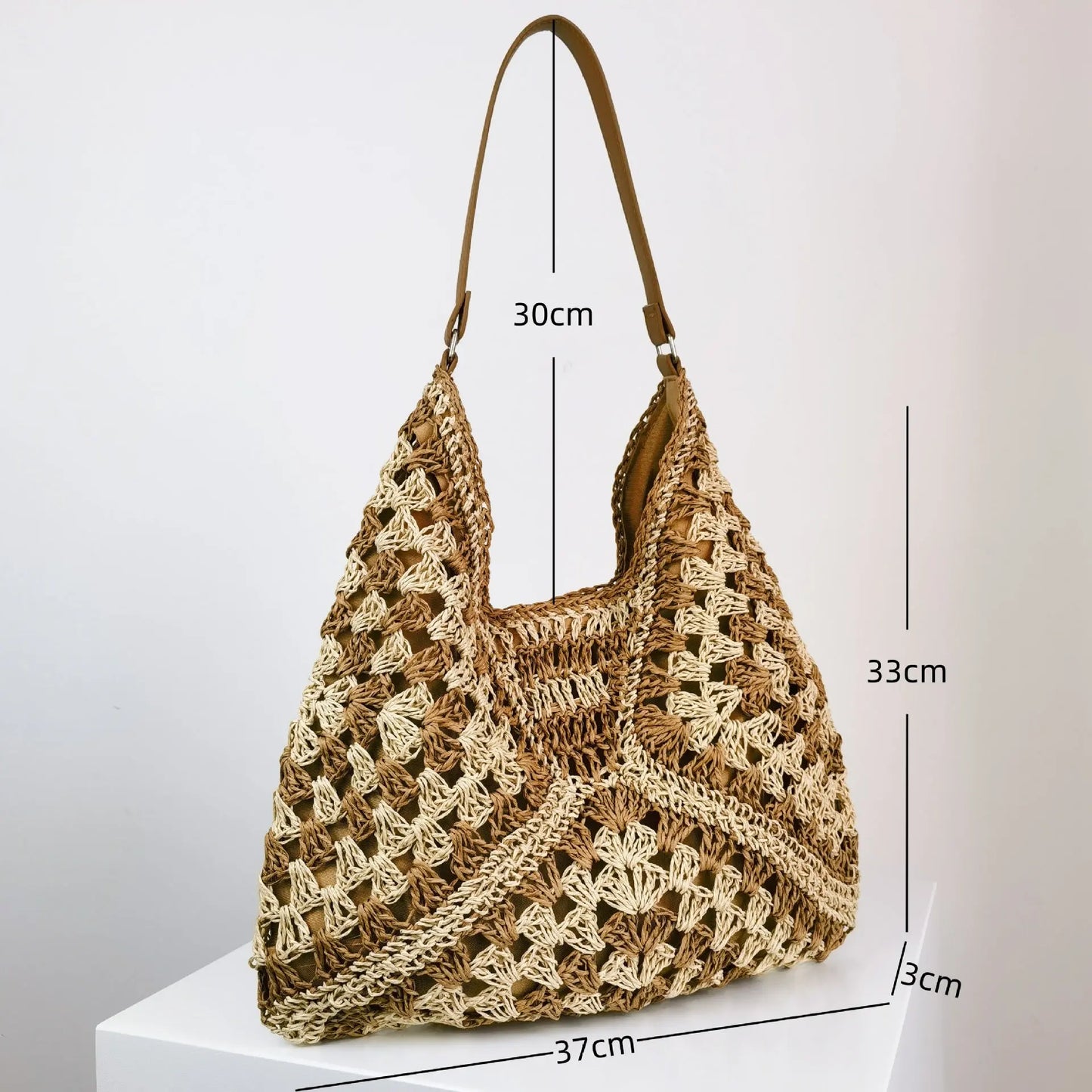 Sac à bandoulière chic en paille tissée