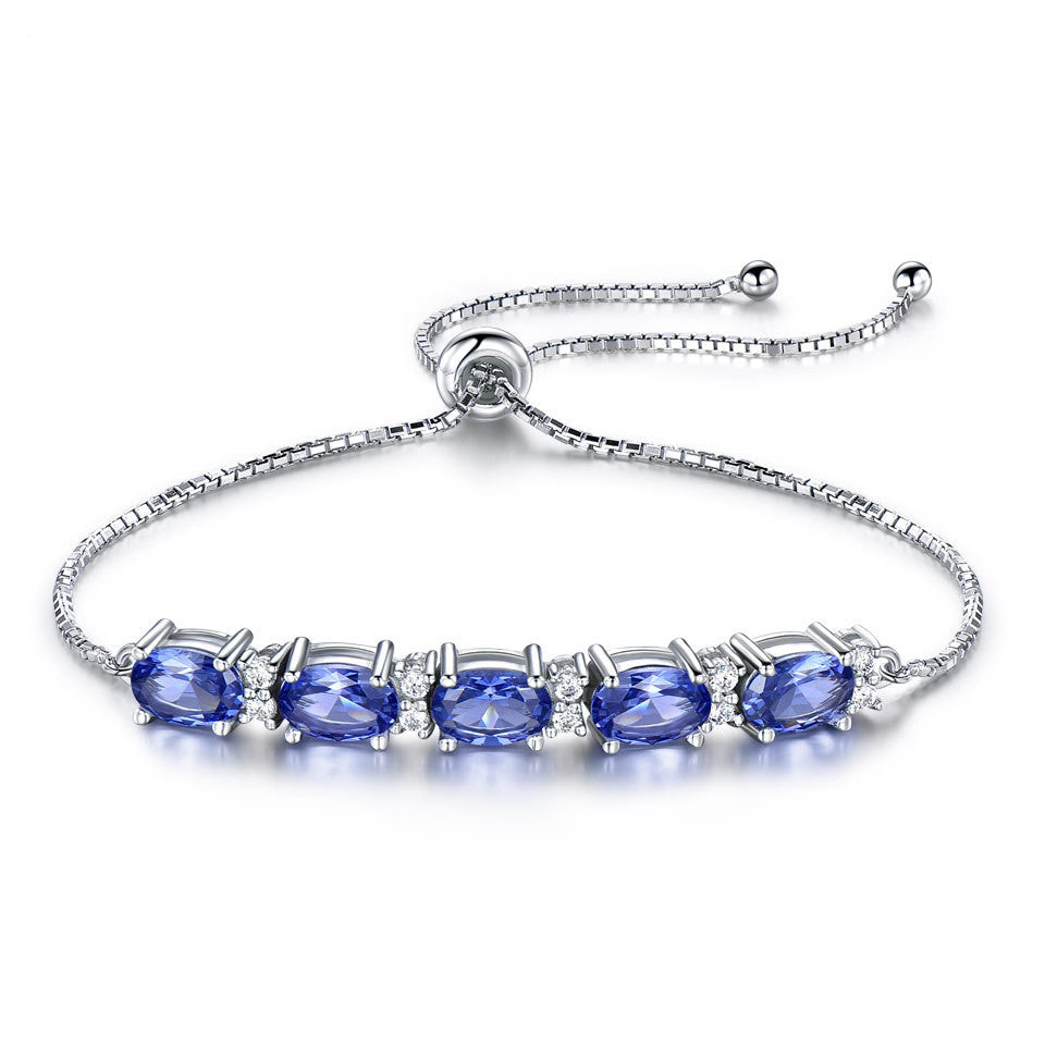 Bracelet à maillons avec topaze bleue