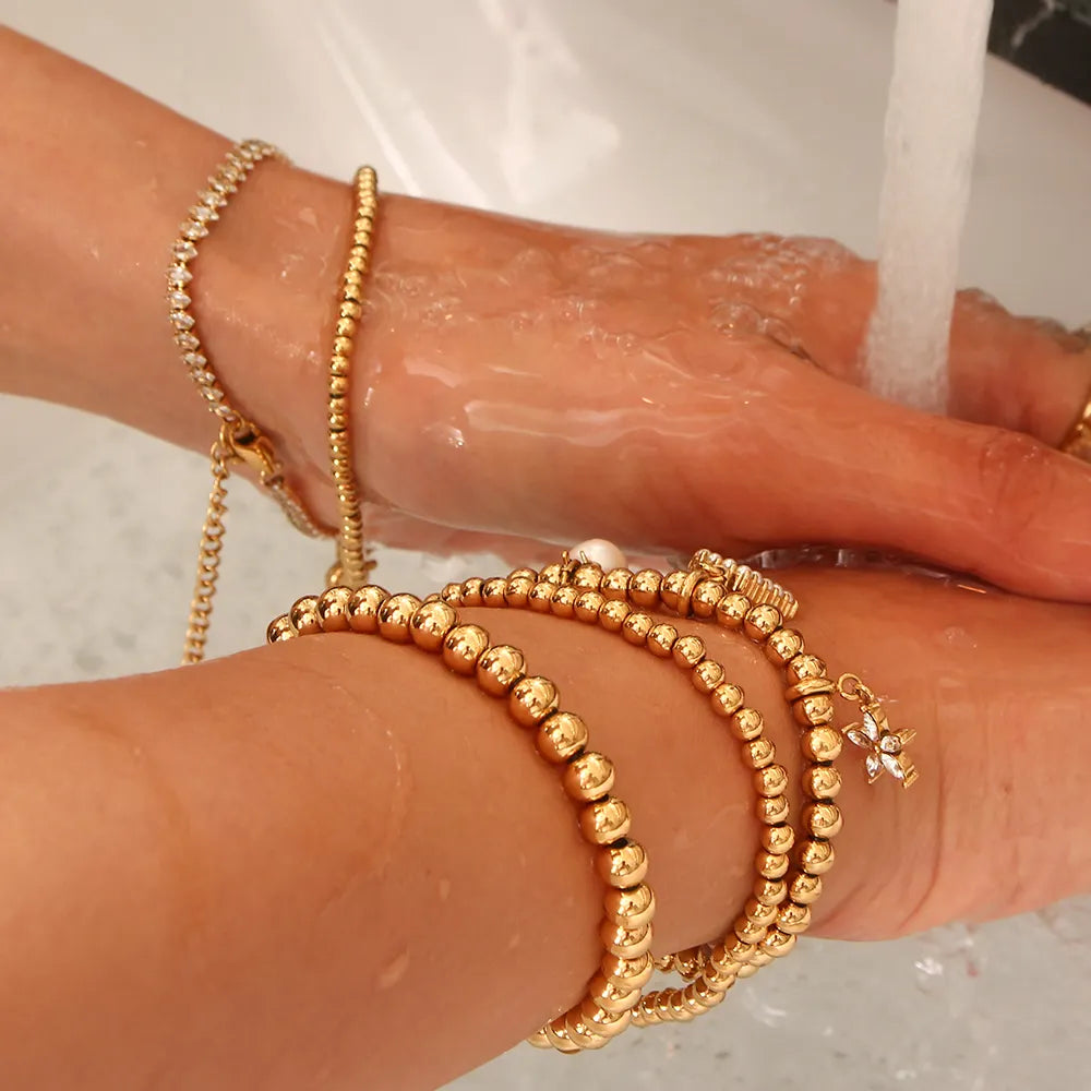 Bracelets de perles élastiques plaqués or pour femmes