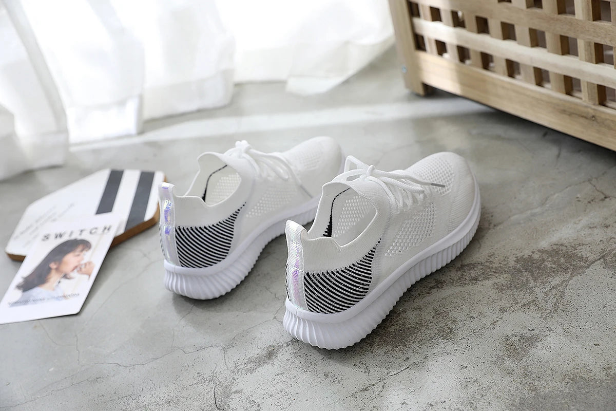 Baskets de sport blanches en maille respirante pour femmes