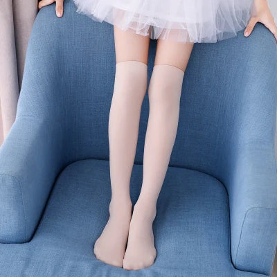 Bas sexy en dentelle et velours transparents jusqu'aux cuisses