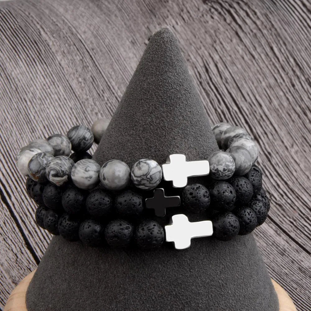 Bracelet croix en acier avec breloque perle de lave