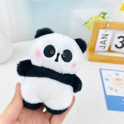 Jouet en peluche panda debout coloré