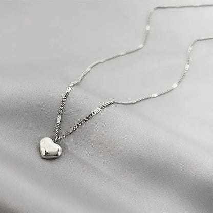 Collier pendentif amour en forme de cœur géométrique pour couples