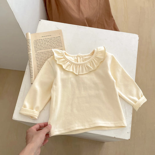 Baby-Mädchen-T-Shirt mit Knöpfen für den Winter