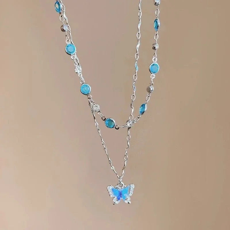 Collier pendentif papillon en cristal bleu romantique 