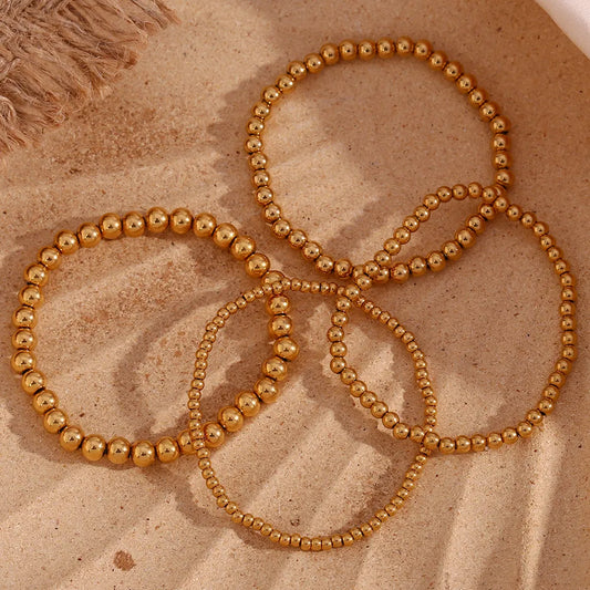 Vergoldete elastische Perlenarmbänder für Damen