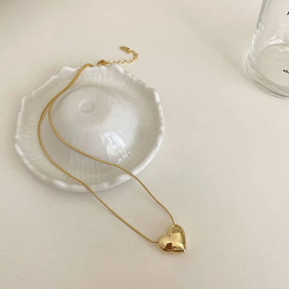 Collier pendentif amour en forme de cœur géométrique pour couples