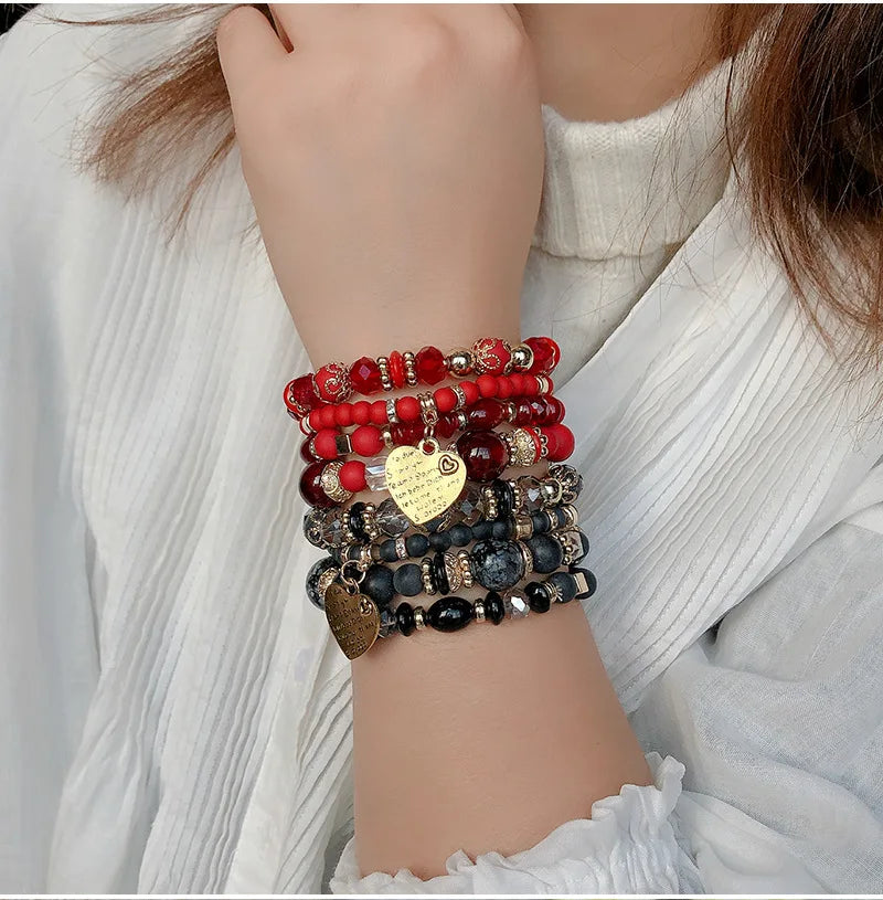 Bracelet de perles avec pendentif d'amour en cristal