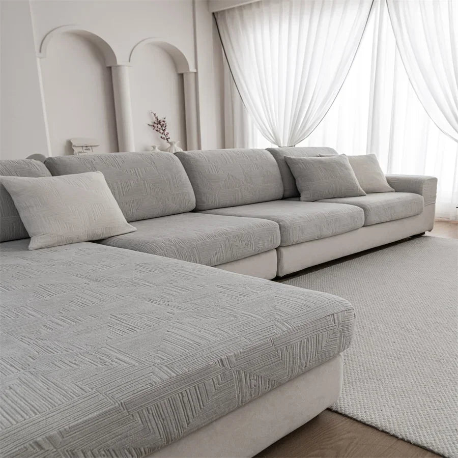 Canapé d'angle et fauteuil en L au design épais