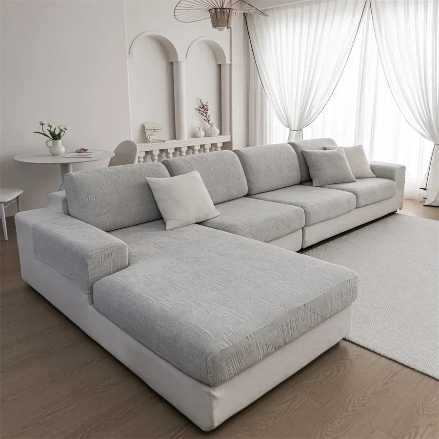 Canapé d'angle et fauteuil en L au design épais