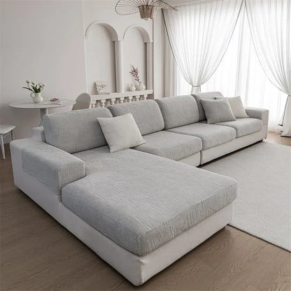 Canapé d'angle et fauteuil en L au design épais