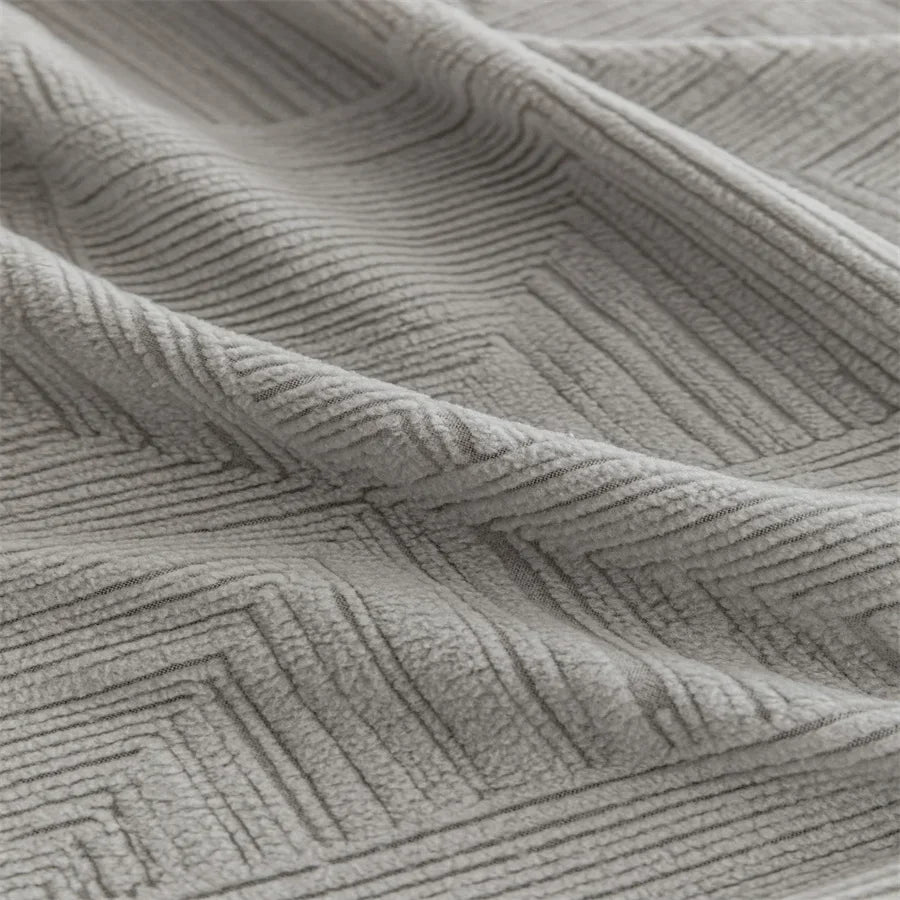 Canapé d'angle et fauteuil en L au design épais