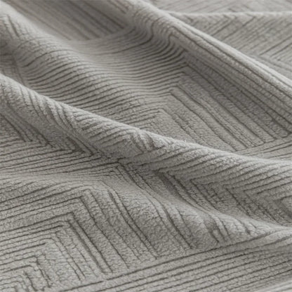 Canapé d'angle et fauteuil en L au design épais