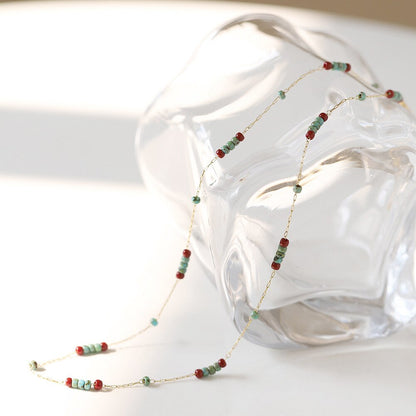 Halskette mit Glasperlen aus Kiefernstein