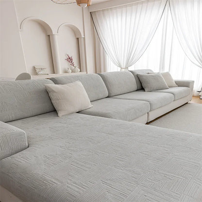 Canapé d'angle et fauteuil en L au design épais