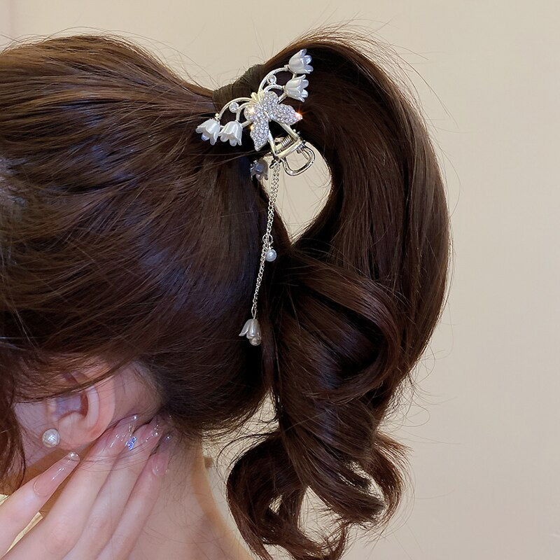 Barrettes à cheveux Pearl Lily avec pompon papillon