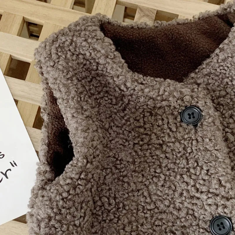 Gilet douillet en laine d'agneau pour bébé