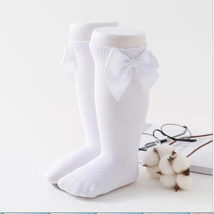 Overknee-Strümpfe aus Seide mit Schleife und Strapsen