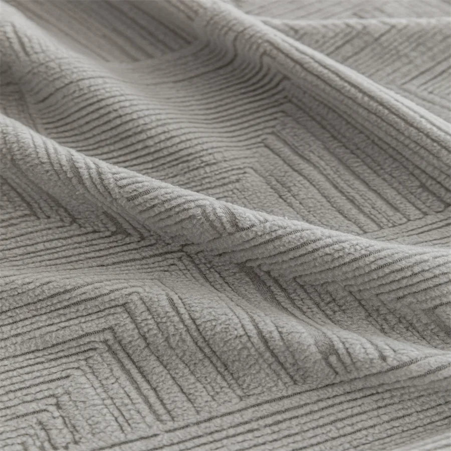 Canapé d'angle et fauteuil en L au design épais