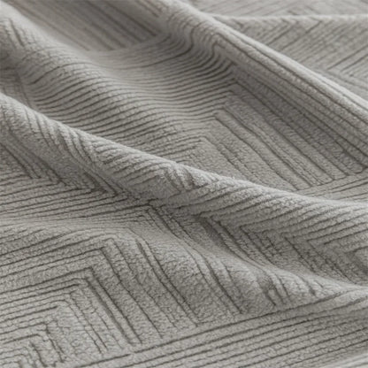 Canapé d'angle et fauteuil en L au design épais