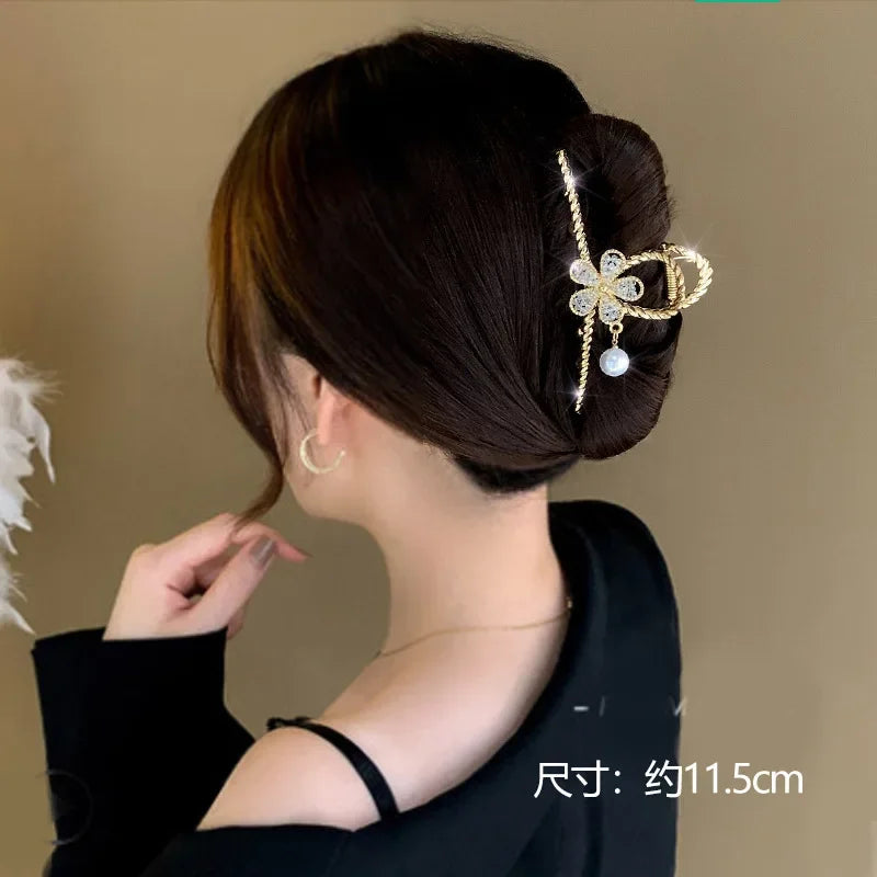 Luxuriöse goldene Schmetterlings-Haarspange