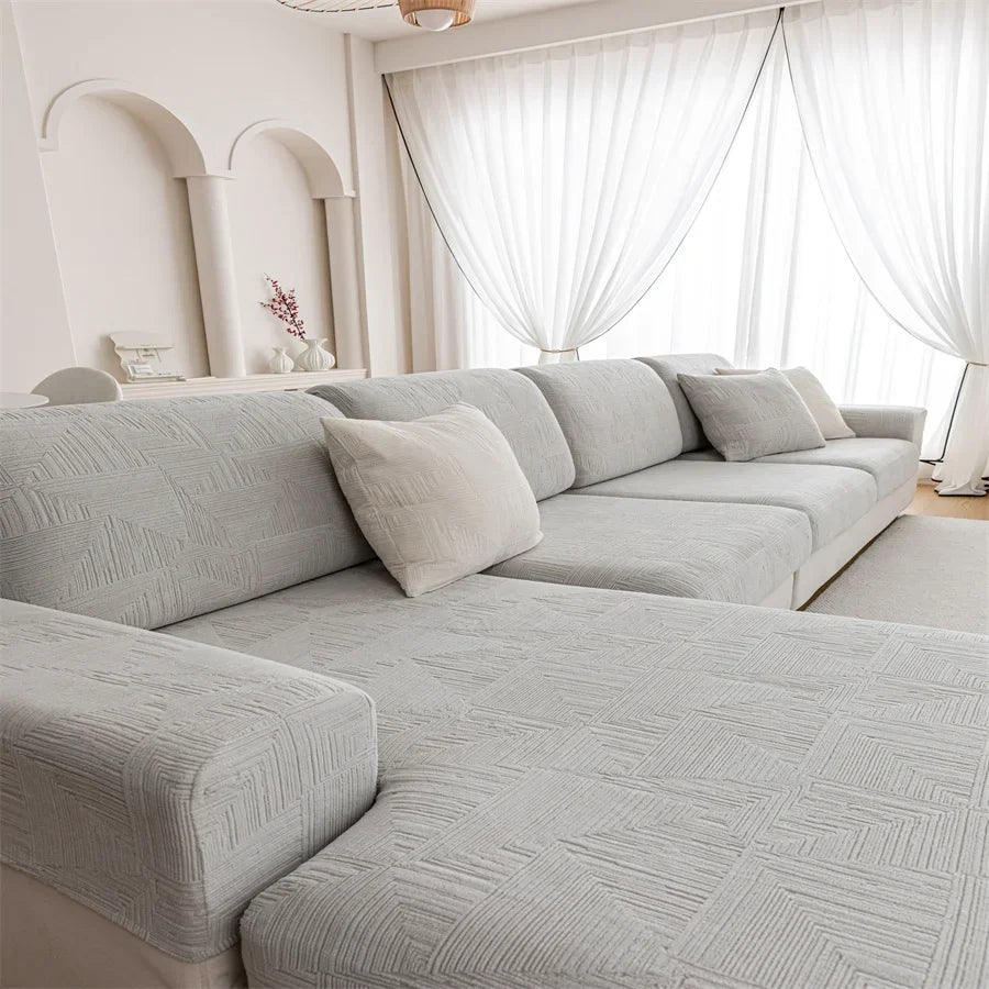 Canapé d'angle et fauteuil en L au design épais