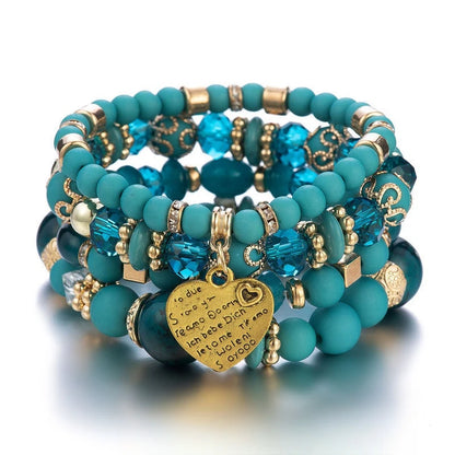 Bracelet de perles avec pendentif d'amour en cristal