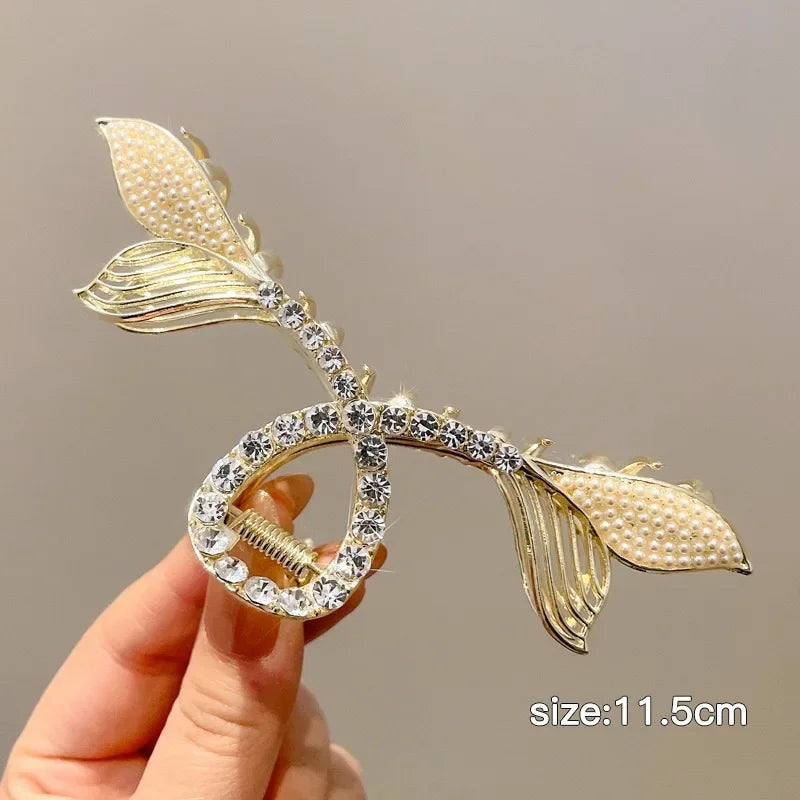 Luxuriöse goldene Schmetterlings-Haarspange