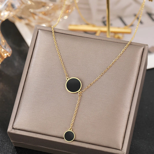 Collier pendentif rond noir vintage