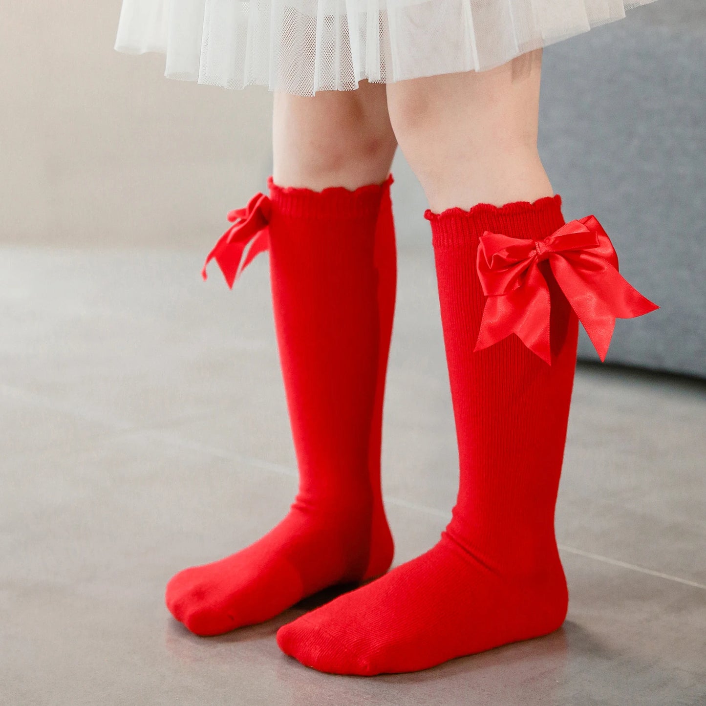Overknee-Strümpfe aus Seide mit Schleife und Strapsen