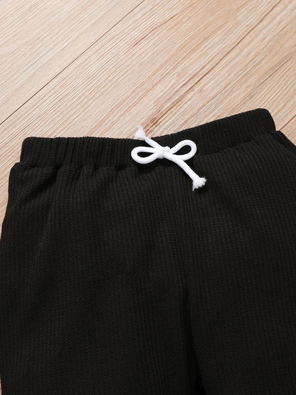 Gemütliche gestrickte Waffel-Buchstaben-Babykleidung für Jungen