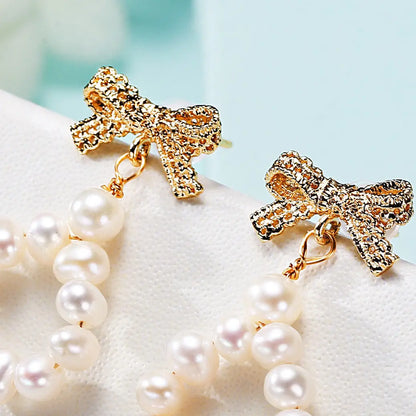 Pearl Bow Earrings - Handmade Beauty