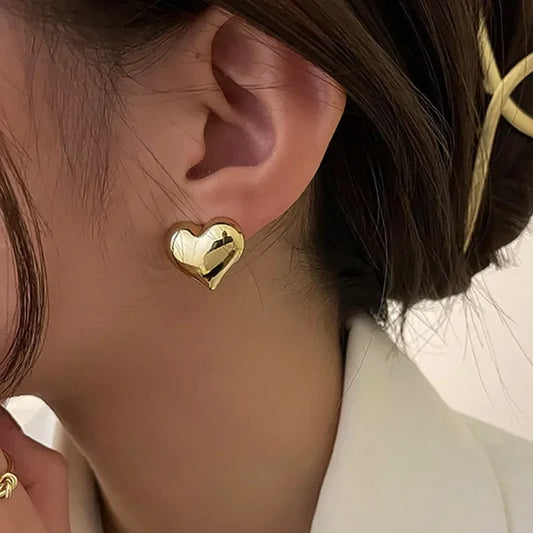 stud earrings, earrings gold, earrings women, gold heart, stud earrings gold, heart shaped earrings, gold heart earrings, women stud earrings, heart earrings, heart shaped stud earrings, stud earrings for women gold
